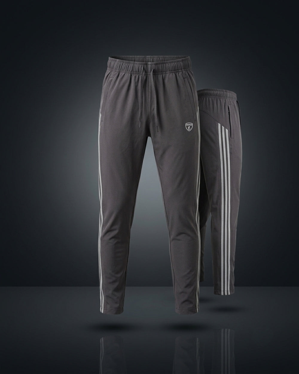 Gray track pants with white stripes, elastic waist, slim athletic fit.
