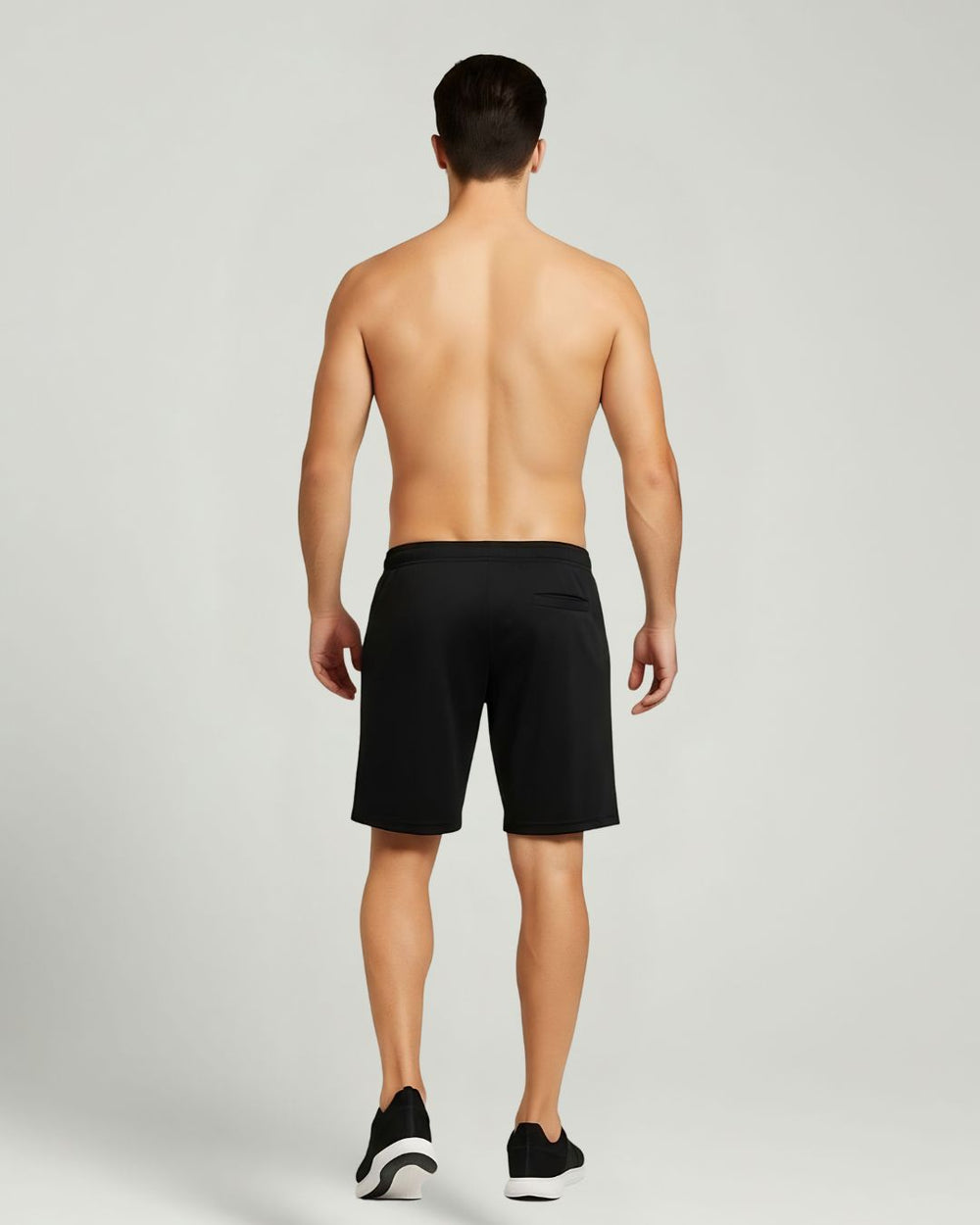 Black athletic shorts, sleek fit, four-way stretch, men's active wear.