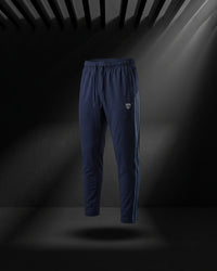 "Dark blue slim fit track pants with side stripe and elastic waist."