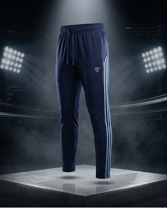 "Dark blue track pants with stripes, lycra blend, slim fit design."